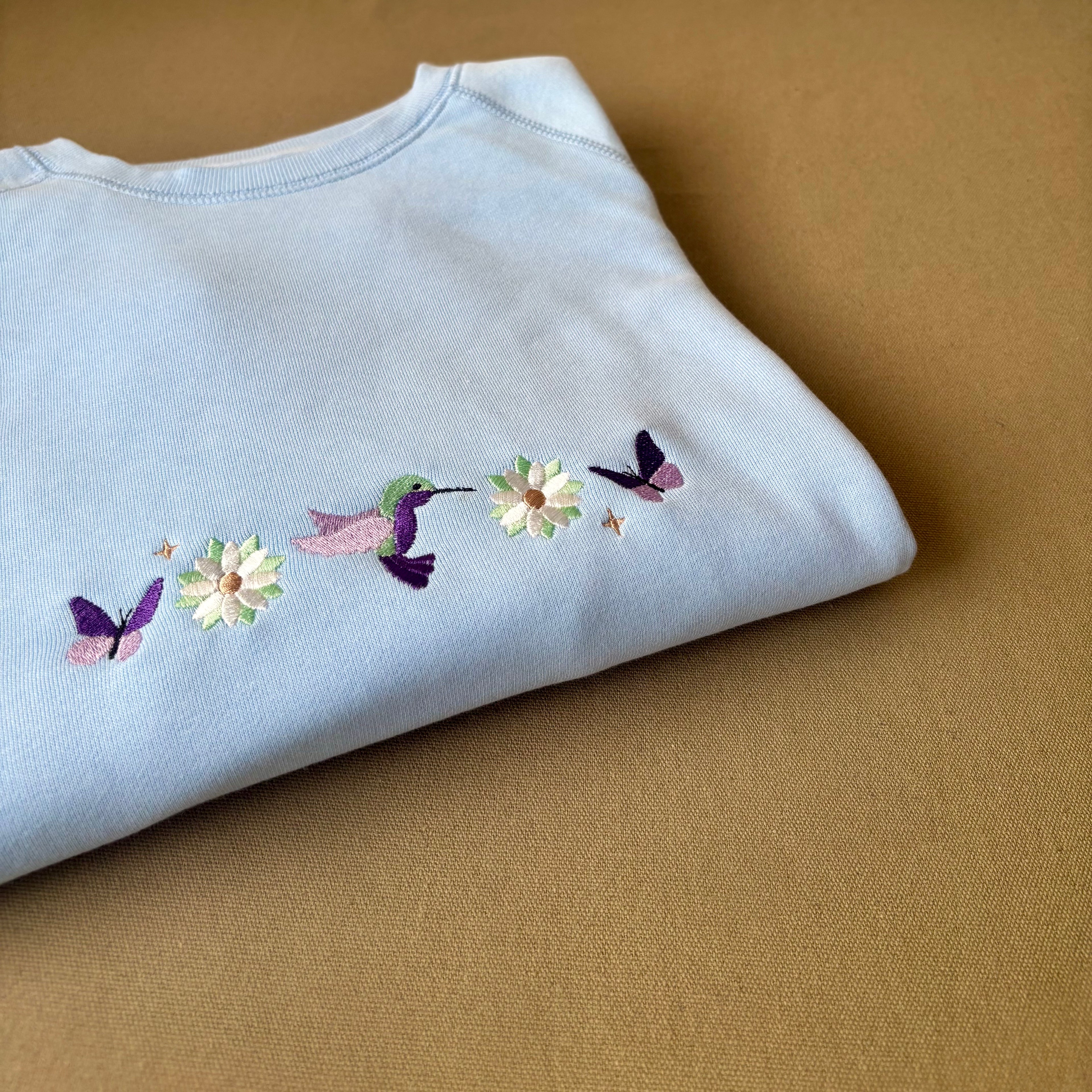 Buzo primavera bordado