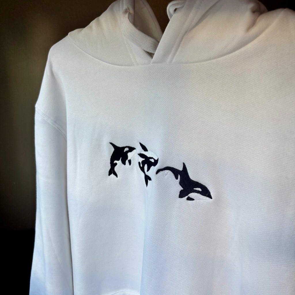 Canguro con orcas bordadas