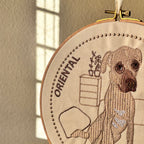 Bastidor con mascota bordada a color