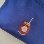 Buzo con mate bordado