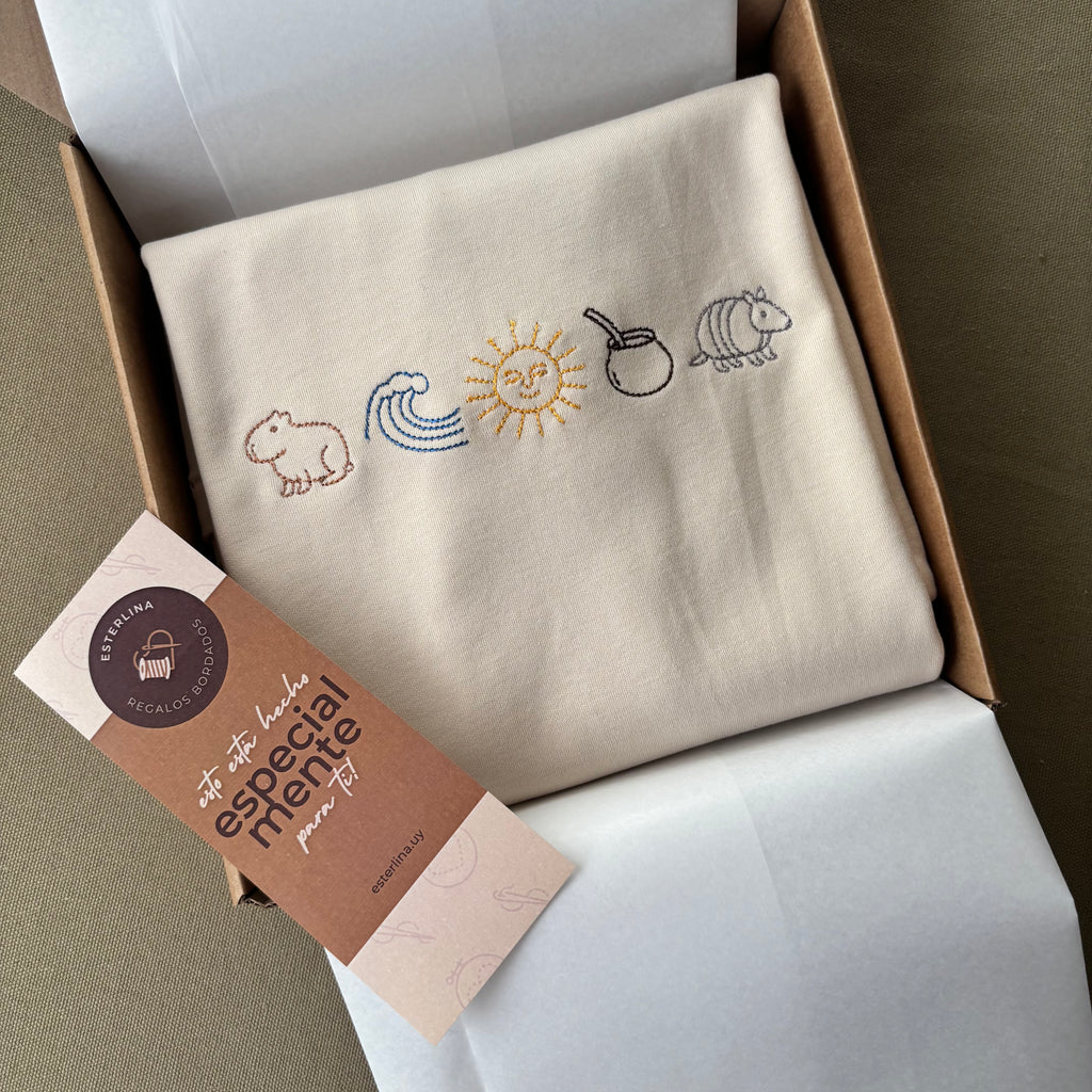 Remera bordada con símbolos uruguayos