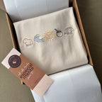 Remera bordada con símbolos uruguayos