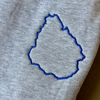 Canguro con contorno de Uruguay bordado