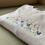 Buzo bordado "abuela" con flores y mariposas