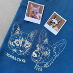 Remera con mascota bordada lineal