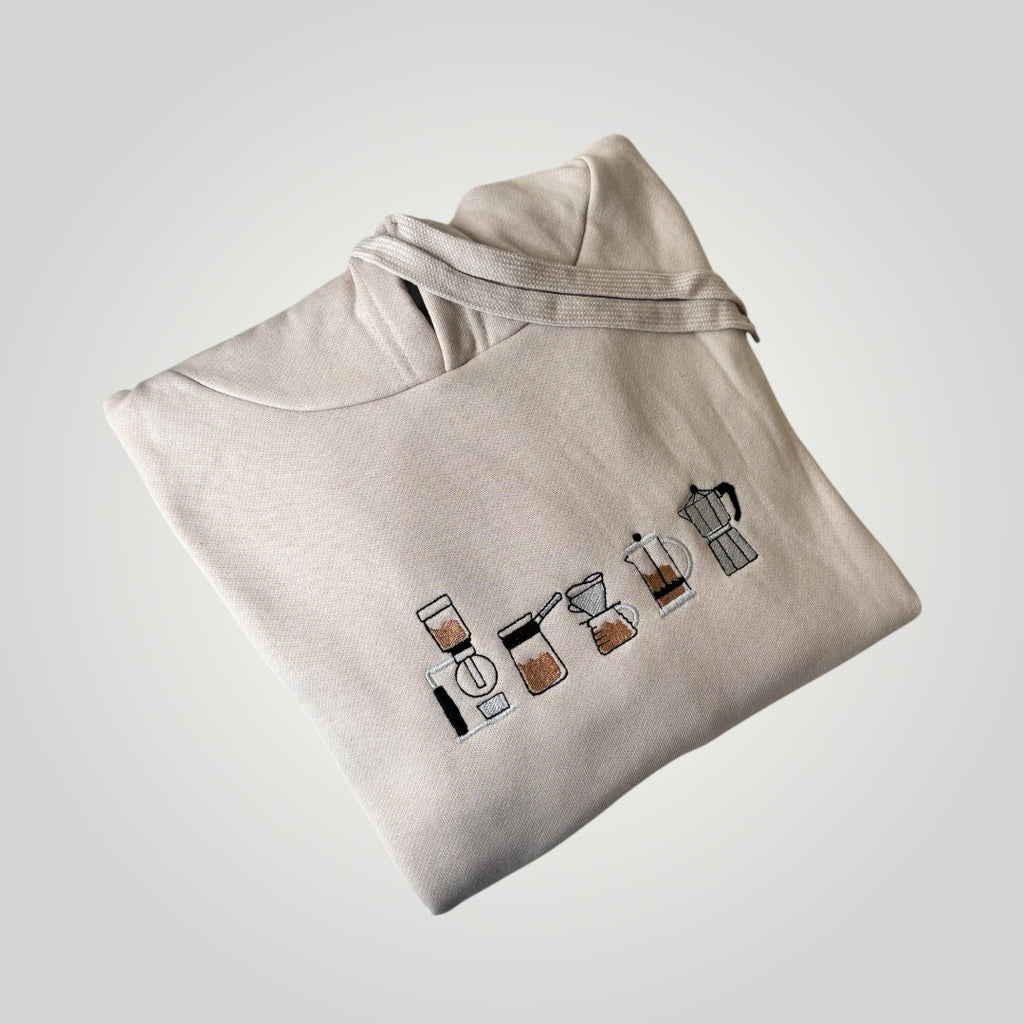 Canguro con cafeteras bordadas