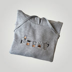 Canguro con cafeteras bordadas