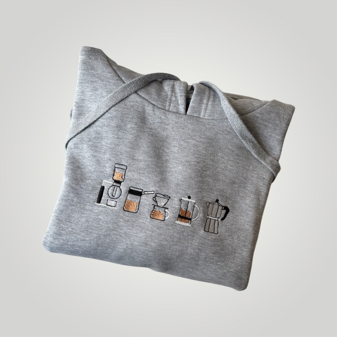 Canguro con cafeteras bordadas