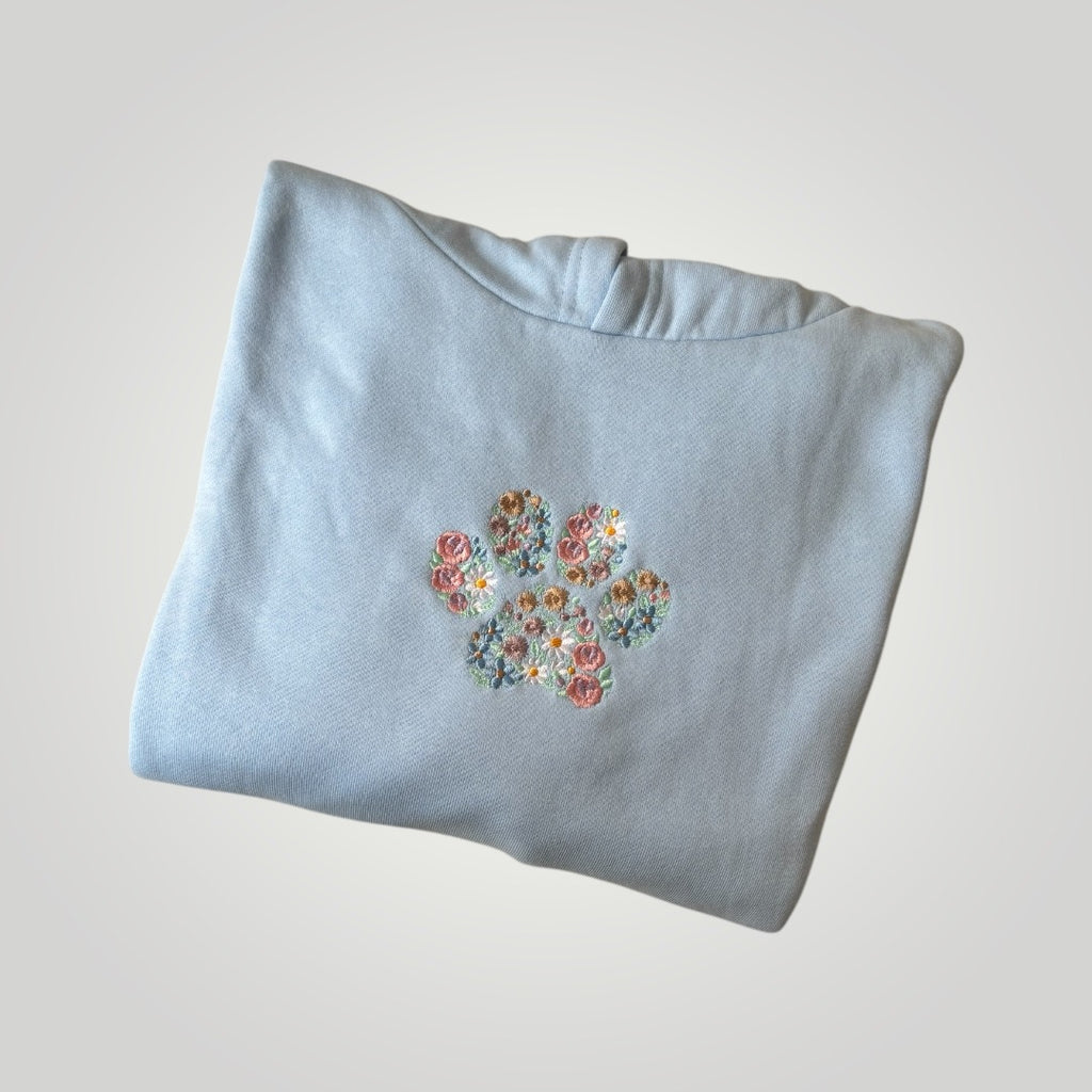 Canguro bordado con huella de flores