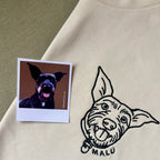 Remera con mascota bordada lineal