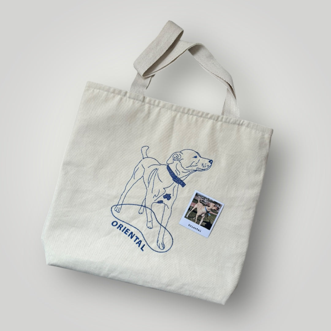 Tote bag con mascota bordada lineal