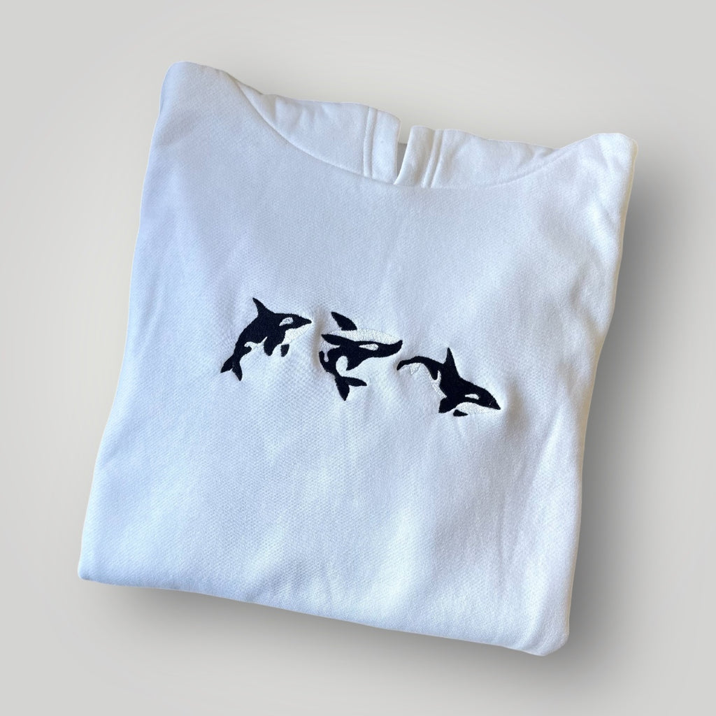 Canguro con orcas bordadas