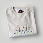 Buzo bordado "abuela" con flores y mariposas