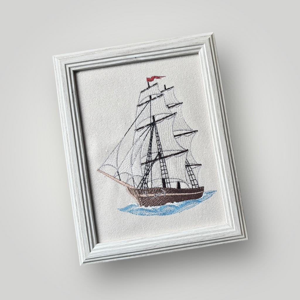 Cuadro bordado con barco de vela