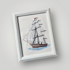 Cuadro bordado con barco de vela